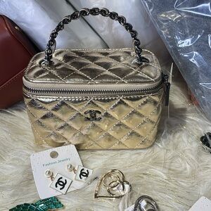 Chic Gold quilted Designer Handbag with Gold Accents